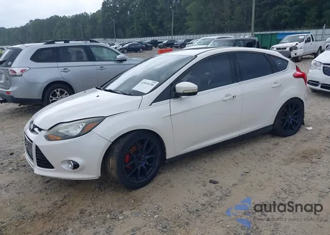 2012 Ford Focus Titanium z USA, uszkodzony, nr VIN 1FAHP3N21CL463011